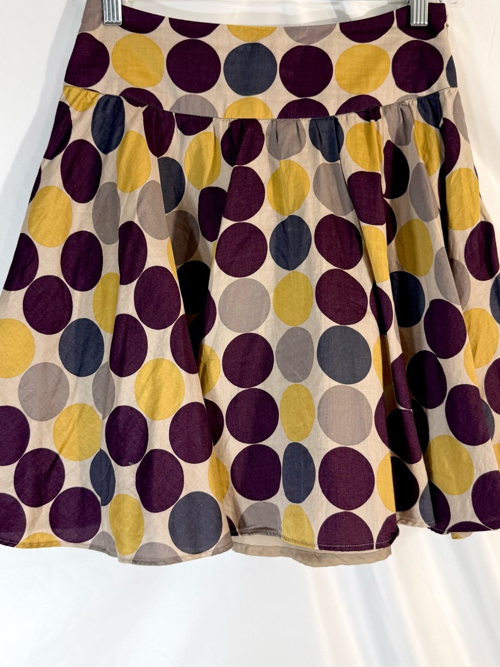 XXI Y2K Yoked Polka Dot Circle Mini Skirt With A Multi-Colored Geometric Print
